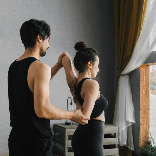 Woman meditating in a calm environment, representing peace of mind.